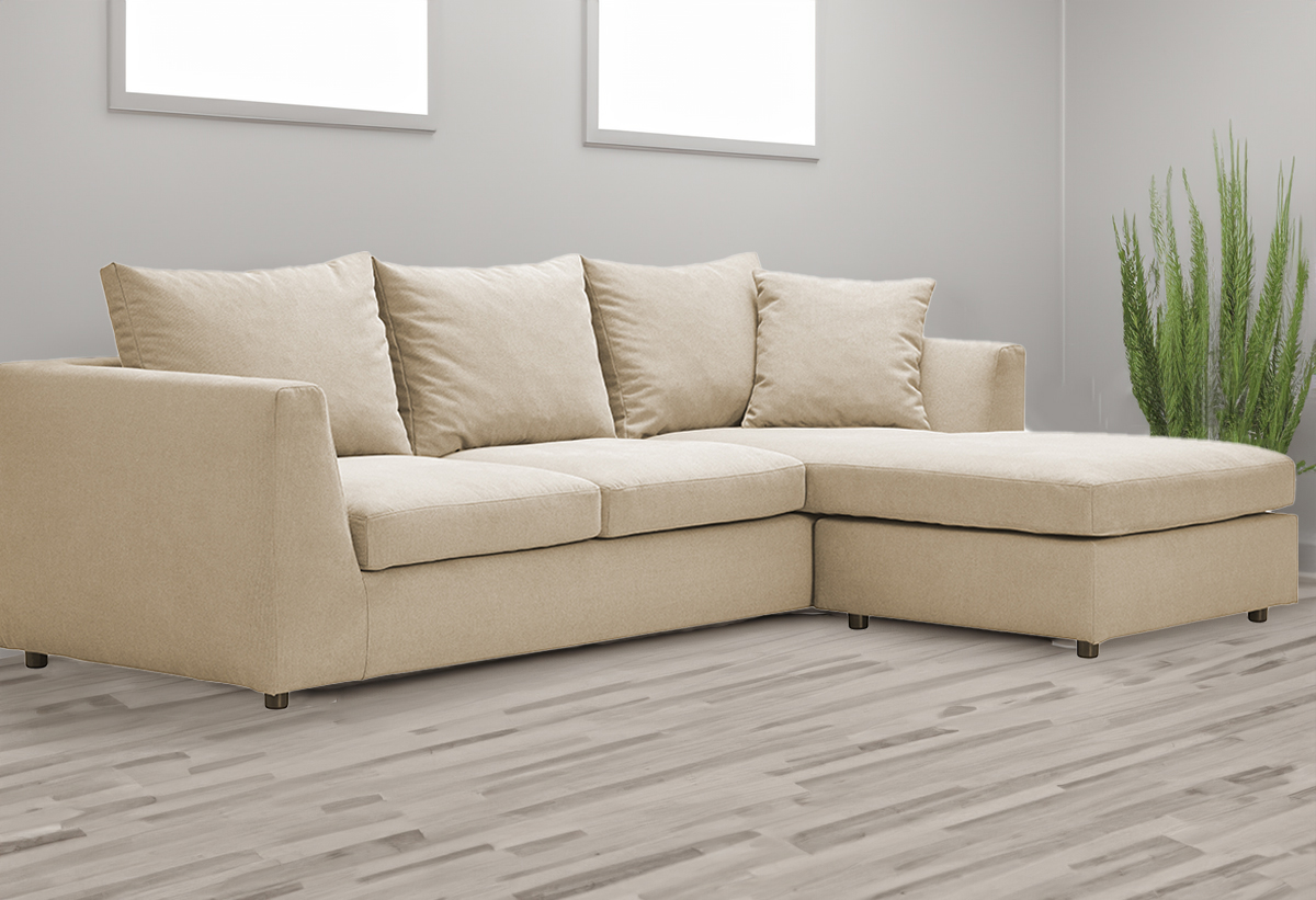 Απεικονίζεται ο καναπές τοποθετημένος σε σαλόνι με ξύλινο πάτωμα.